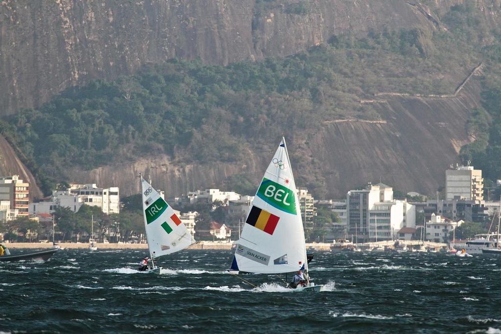 Annalise Murphy (IRL) and Anne-Marie van Acker (BEL) practice in the  squall ahead of the the Laser Radial Medal Race © Richard Gladwell www.photosport.co.nz